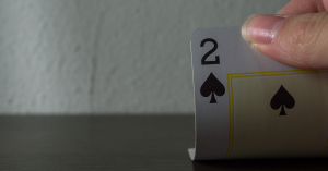 Двійка пік: карта з тисячами значень у грі, Таро та повсякденному мовленні